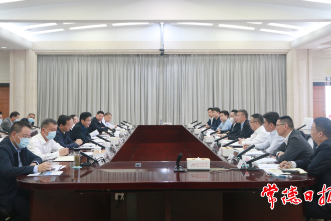 曹志強周振宇與華潤集團王永輝一行座談